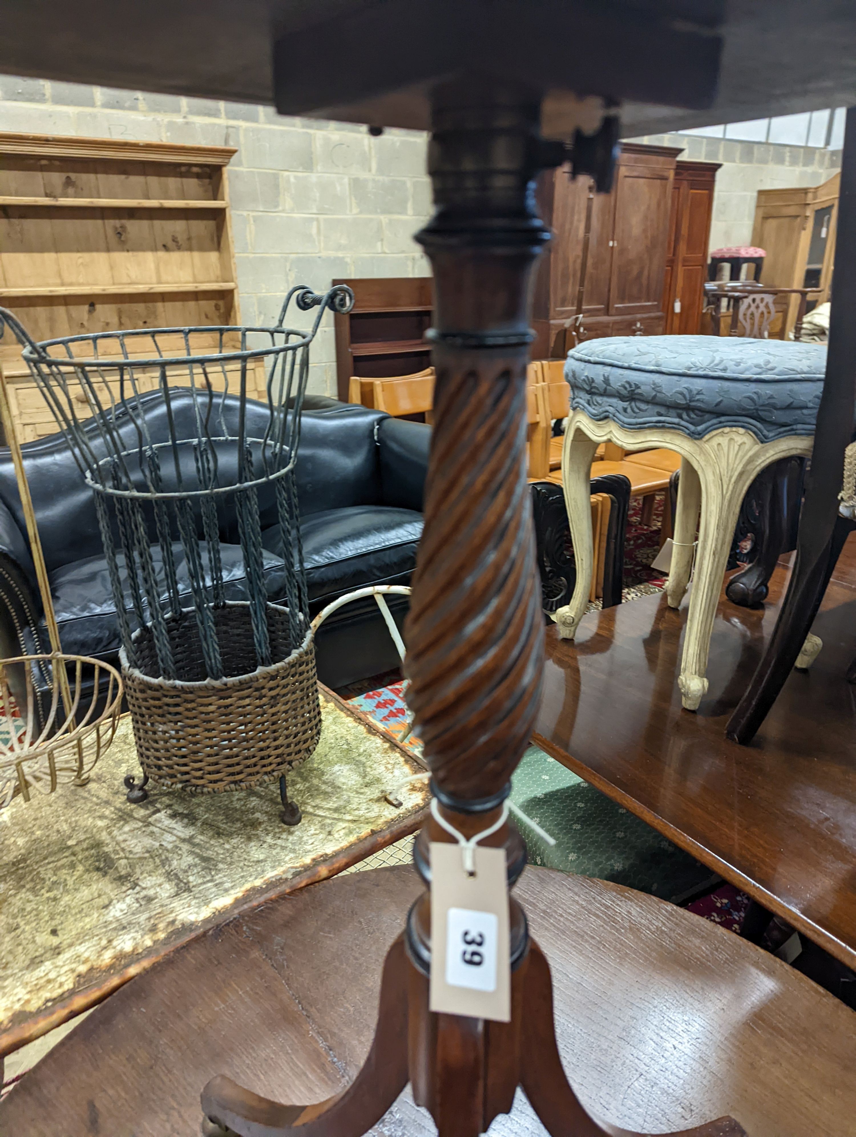 A Regency mahogany metamorphic tripod wine table / fire screen, width 45cm, depth 33cm, lowest height 75cm